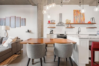 Loft-style living in the North Loop, done right! This oversized - photo 13