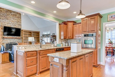 This exquisite home in the prestigious Windmill Plantation