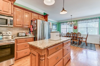 This exquisite home in the prestigious Windmill Plantation