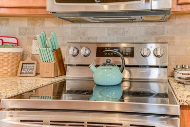 This exquisite home in the prestigious Windmill Plantation