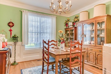 This exquisite home in the prestigious Windmill Plantation