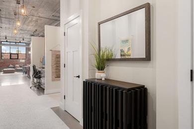Loft-style living in the North Loop, done right! This oversized - photo 19