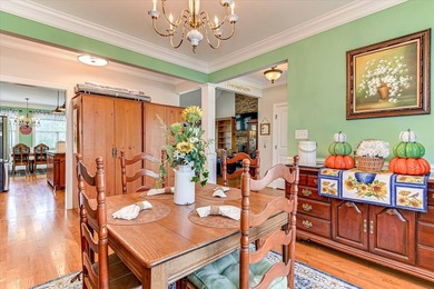 This exquisite home in the prestigious Windmill Plantation