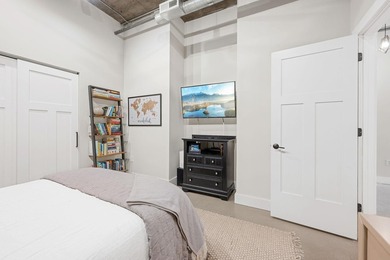 Loft-style living in the North Loop, done right! This oversized - photo 24