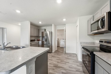 Beautiful 2024-built home offering modern coastal living with no - photo 9