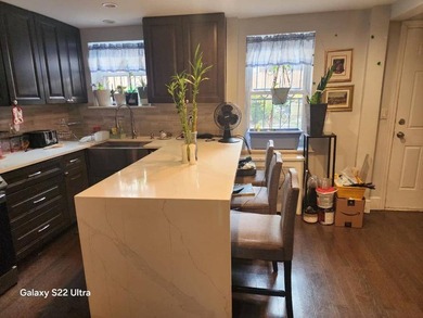 Located in Clinton Hill, 60 PUTNAM AVE, a three-family - photo 5