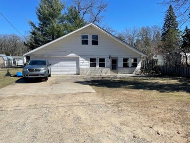 Lake Home For Sale in Prudenville, Michigan