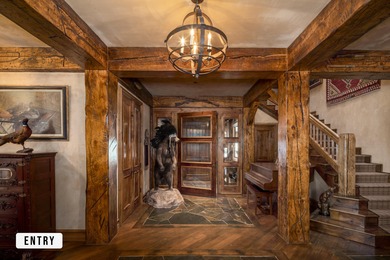 Quintessential log & stone Creekside Lodge estate. Near the base - photo 2