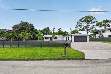 Stunning Fully Renovated 4-Bedroom, 3-Bathroom Modern Oasis with - photo 1