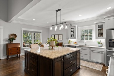 Tucked away on a private, beautifully landscaped lot, this home - photo 14