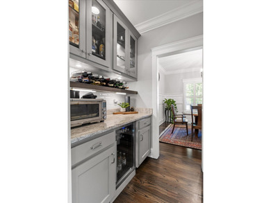 Tucked away on a private, beautifully landscaped lot, this home - photo 18