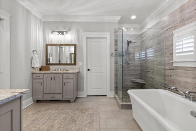 Tucked away on a private, beautifully landscaped lot, this home - photo 20