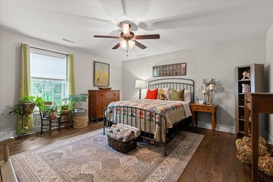 Tucked away on a private, beautifully landscaped lot, this home - photo 23
