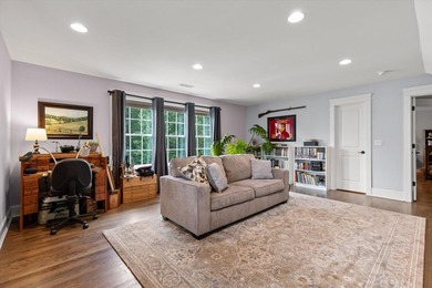 Tucked away on a private, beautifully landscaped lot, this home - photo 26