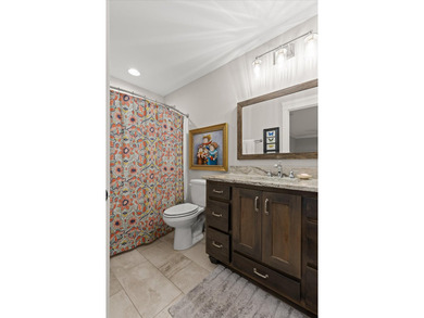 Tucked away on a private, beautifully landscaped lot, this home - photo 27