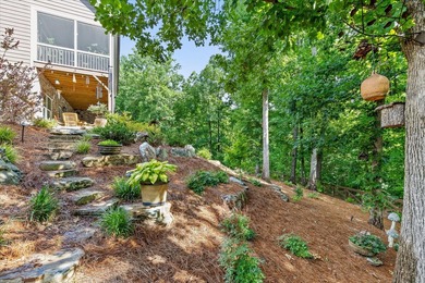 Tucked away on a private, beautifully landscaped lot, this home - photo 40