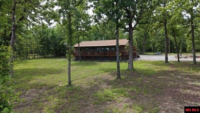 Tucked away in the beautiful Ozarks near Bull Shoals Lake, this - photo 2