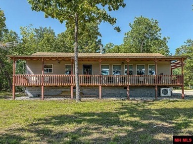 Tucked away in the beautiful Ozarks near Bull Shoals Lake, this - photo 3
