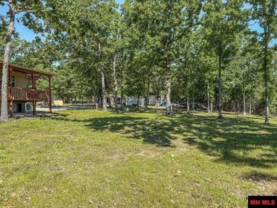 Tucked away in the beautiful Ozarks near Bull Shoals Lake, this - photo 7
