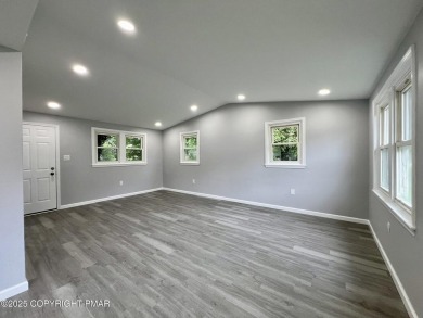 In-town living at its finest! TOTALLY RENOVATED Ranch home on