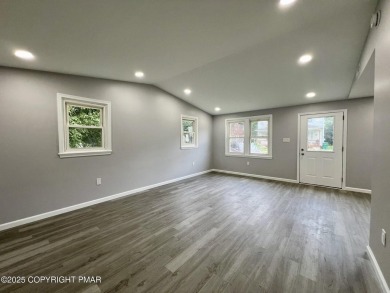 In-town living at its finest! TOTALLY RENOVATED Ranch home on