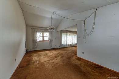 Set on an impressive 75' x 220' property in Bay Shore, this - photo 14