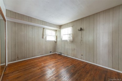 Set on an impressive 75' x 220' property in Bay Shore, this - photo 15