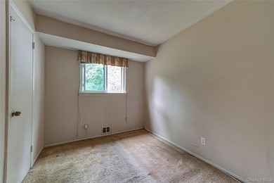 Set on an impressive 75' x 220' property in Bay Shore, this - photo 16