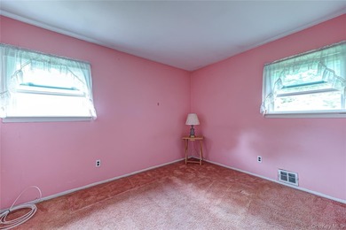Set on an impressive 75' x 220' property in Bay Shore, this - photo 17