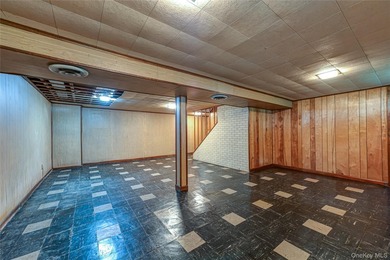Set on an impressive 75' x 220' property in Bay Shore, this - photo 22