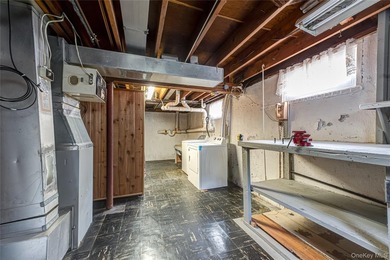 Set on an impressive 75' x 220' property in Bay Shore, this - photo 23