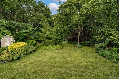 Set on an impressive 75' x 220' property in Bay Shore, this - photo 25
