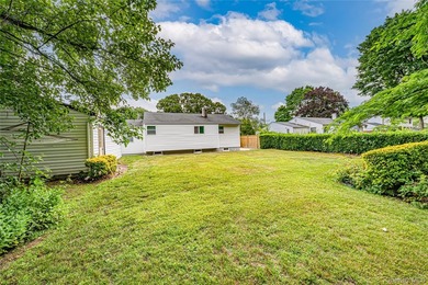 Set on an impressive 75' x 220' property in Bay Shore, this - photo 28