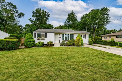 Set on an impressive 75' x 220' property in Bay Shore, this - photo 31