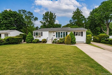 Set on an impressive 75' x 220' property in Bay Shore, this - photo 32