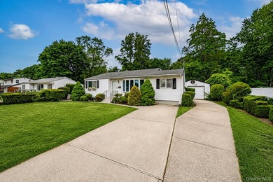 Set on an impressive 75' x 220' property in Bay Shore, this - photo 34