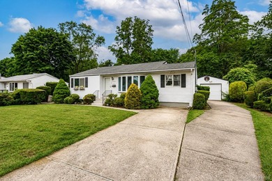 Set on an impressive 75' x 220' property in Bay Shore, this - photo 35