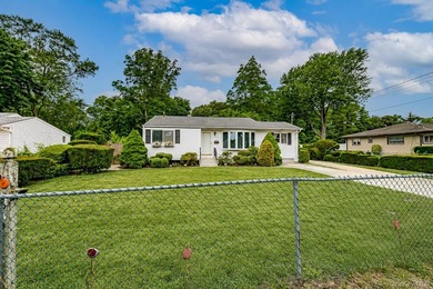 Set on an impressive 75' x 220' property in Bay Shore, this - photo 37