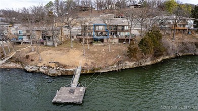 Front-row main channel views, multiple boat slips, and turnkey - photo 53