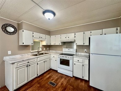 Great price improvement and you own your own land - no lot rente - photo 8