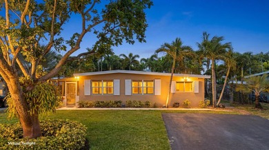 Welcome to this charming and beautifully maintained 3-bedroom - photo 1