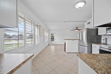 Welcome to this charming and beautifully maintained 3-bedroom - photo 6