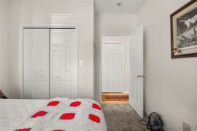 Enjoy peaceful lake living in this beautifully situated