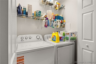 Enjoy peaceful lake living in this beautifully situated