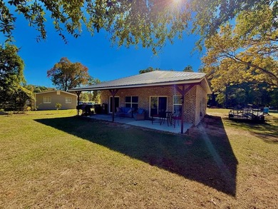Enjoy riverfront living at its best in this completely renovated - photo 15