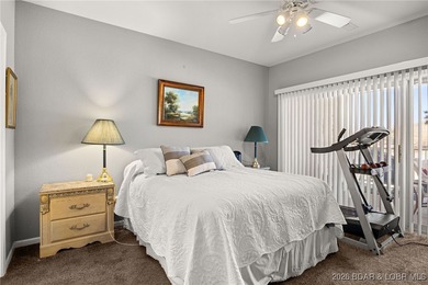 Enjoy peaceful lake living in this beautifully situated