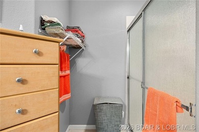 Enjoy peaceful lake living in this beautifully situated