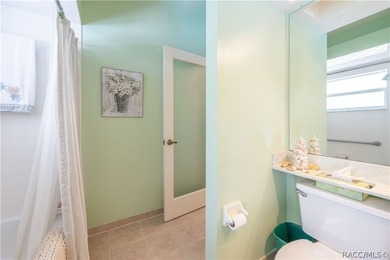 This charming 3-bedroom, 2-bath pool home with an oversized - photo 32