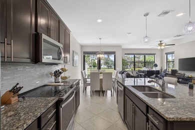 Move-in ready end-unit townhome in the sought-after Fields - photo 1