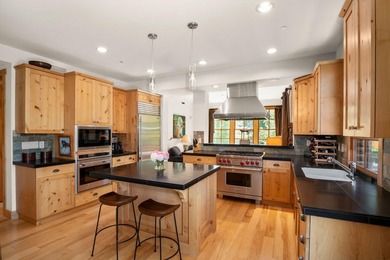 One level. open, light-filled living with upgraded kitchen